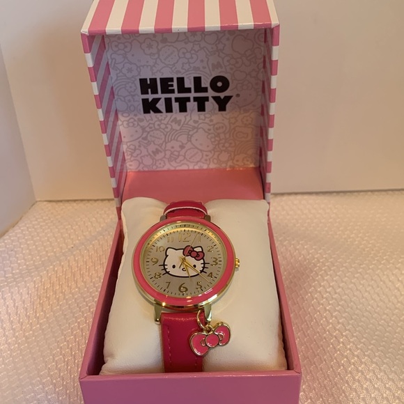 NWT Hello Kitty Analog Watch Pink Band Pink and Gold Tone Bezel with Bow Charm - Picture 2 of 4